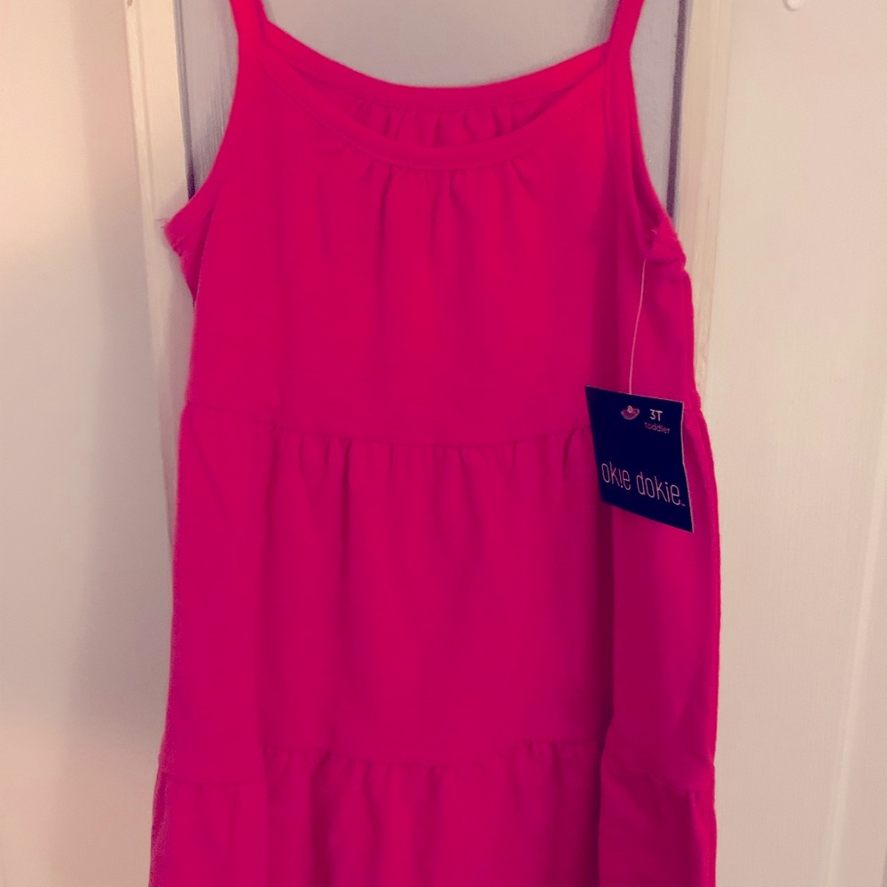 Tank dress for a cute little girl. It 3T Red . Cotton and polyester.